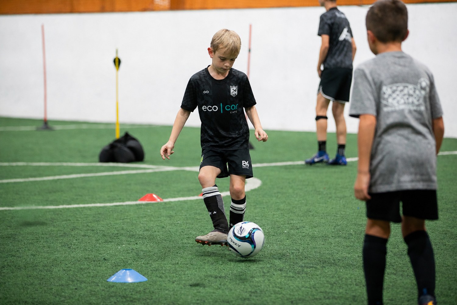 Young FM Elite players practicing close ball control